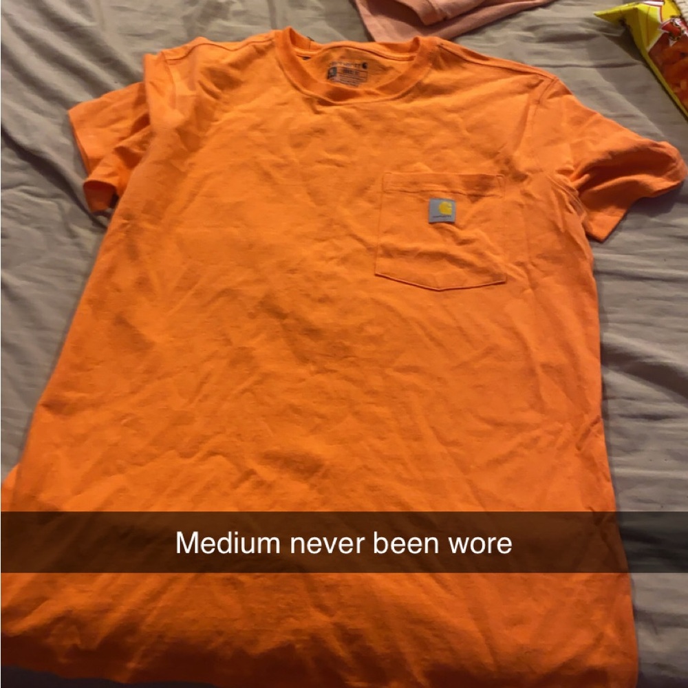 Carhartt shirt. Size medium. Never been wore. Tags were taken off.
